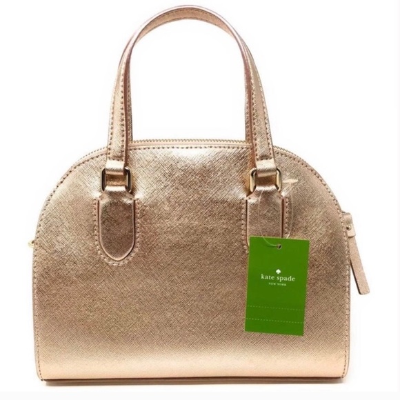 kate spade Handbags - NWT Kate Spade Purse In Rose Gold